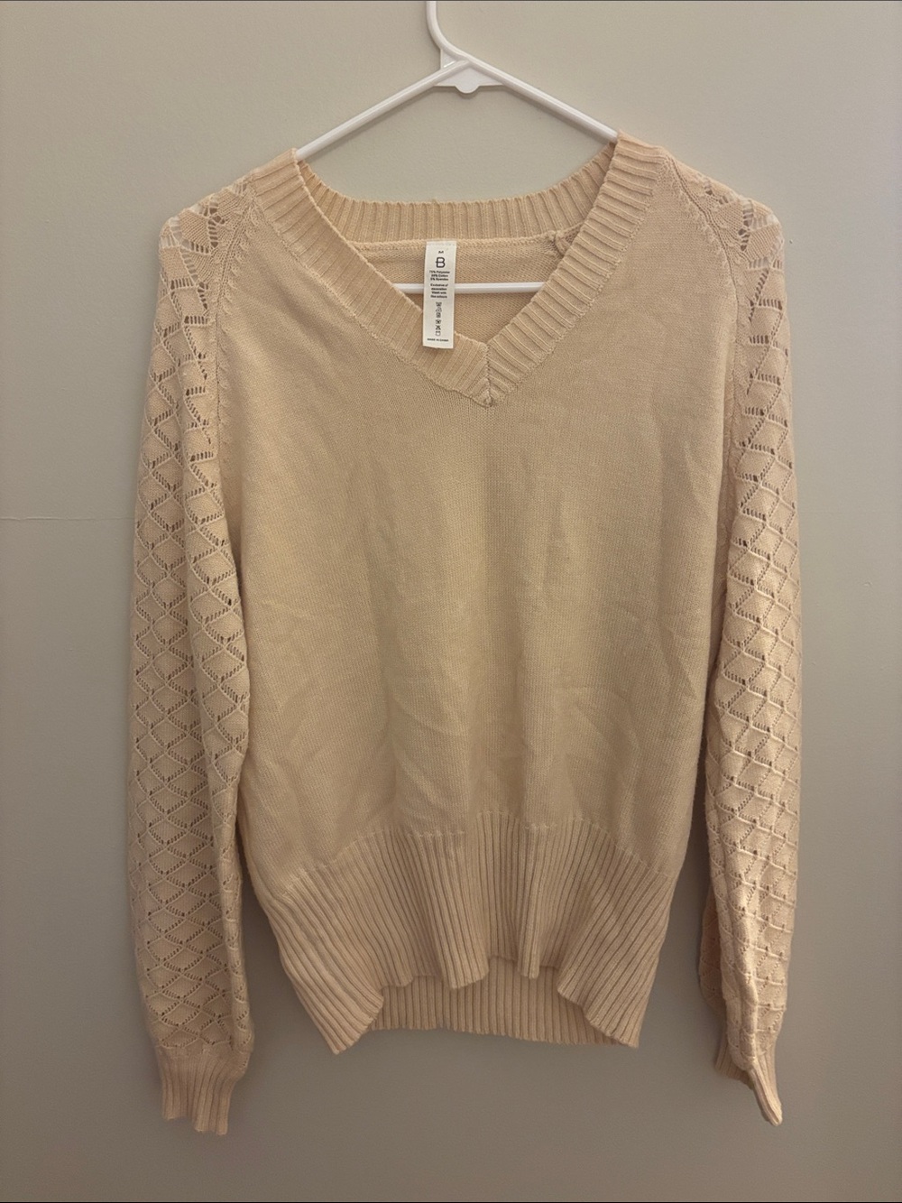 Super soft, lightweight sweater by B. Women’s size medium.